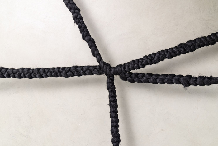 Binta Diaw, Dïà s p o r a, 2021. Synthetic hair, soil, seeds, variable dimensions. Courtesy Binta Diaw studio.