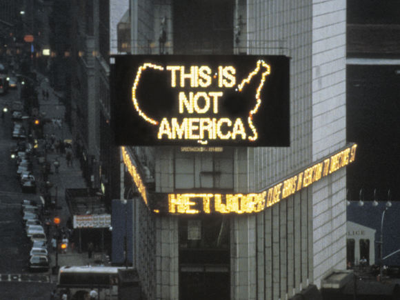 Alfredo Jaar, A Logo for America, 1987. Computer animation, 38 seconds. Commissioned by the Public Art Fund for the Spectacolor Sign, Times Square, New York, April 1987. Photo courtesy of the artist and Galerie Lelong, New York. © Alfredo Jaar.
