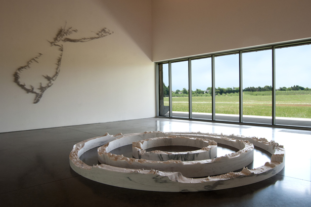 Platform: Maya Lin, 2014. Exhibition view, Parrish Art Museum, Water Mill, New York, July 4 to October 13, 2014. In foreground, three works in marble: Equator (2014), Latitude New York City (2013) and Arctic Circle (2013). On wall, Pin River—Sandy, 2013. Steel straight pins. Courtesy Pace Gallery, New York. Photo: Gary Mamay.