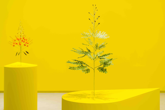 Kapwani Kiwanga, The Marias, 2020. Installation including wall paint and paper flowers on custom plinth. Collection of the Remai Modern, Saskatoon, Canada. Purchased with the support of the Frank and Ellen Remai Foundation, 2021. © ADAGP, Paris. 